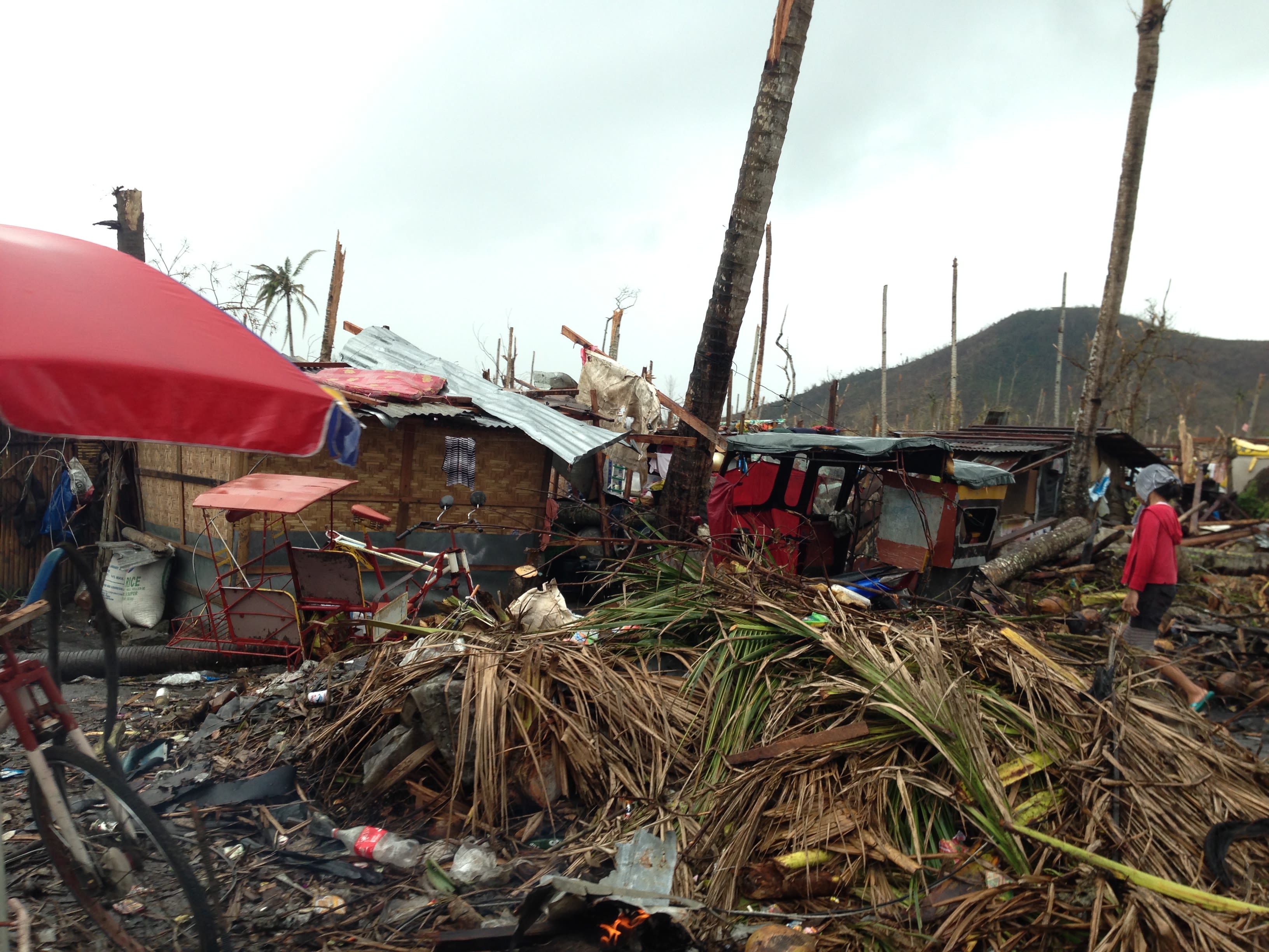 Some residents took about two weeks to clear up the debris from Yolanda's destruction. By Makoi Popioco, November 2013